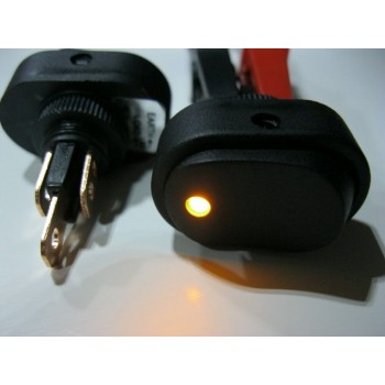 OVAL ROCKER SWITCH 12 VOLT. ILLUMINATED YELLOW